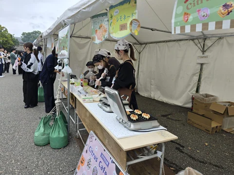 Food stall staff preparing croffles