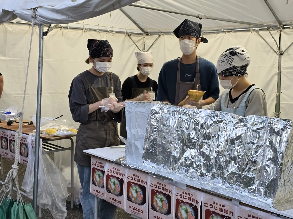 Last year's KIT Festival: Students preparing miso soup at a food stall
