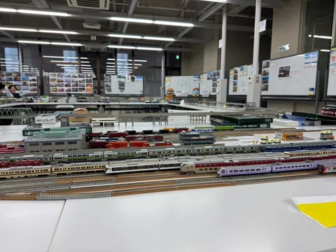 Model trains displayed on a large railway layout